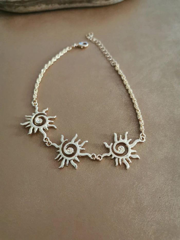 Bracelet de cheville ou de poignet soleil spirale doré