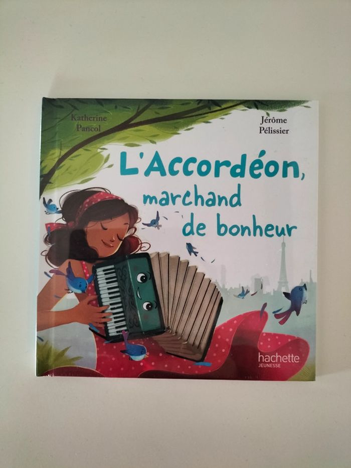 Livre l'accordéon, marchand de bonheur