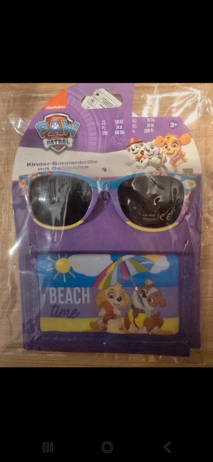 Lunette de soleil Stella paw patrol +porte monaie paw patrol neuf