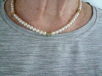 Collier en perles et dorures