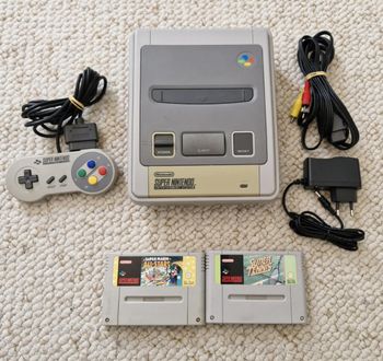 Console super nintendo snes et jeux