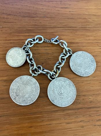 Bracelet avec pièces de collection tout en argent ancien