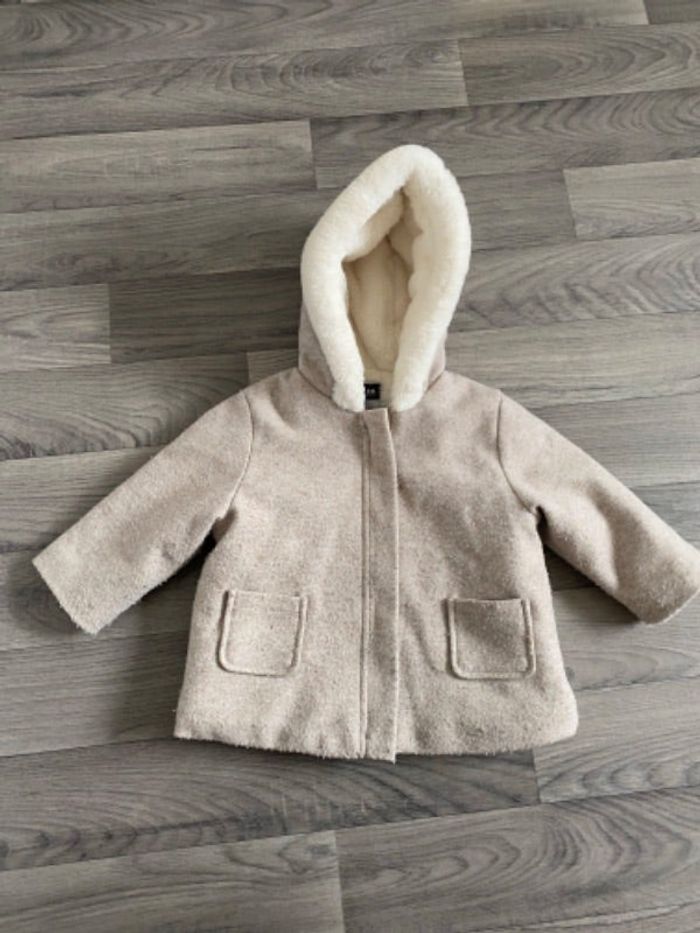 Manteau fourré moumoute