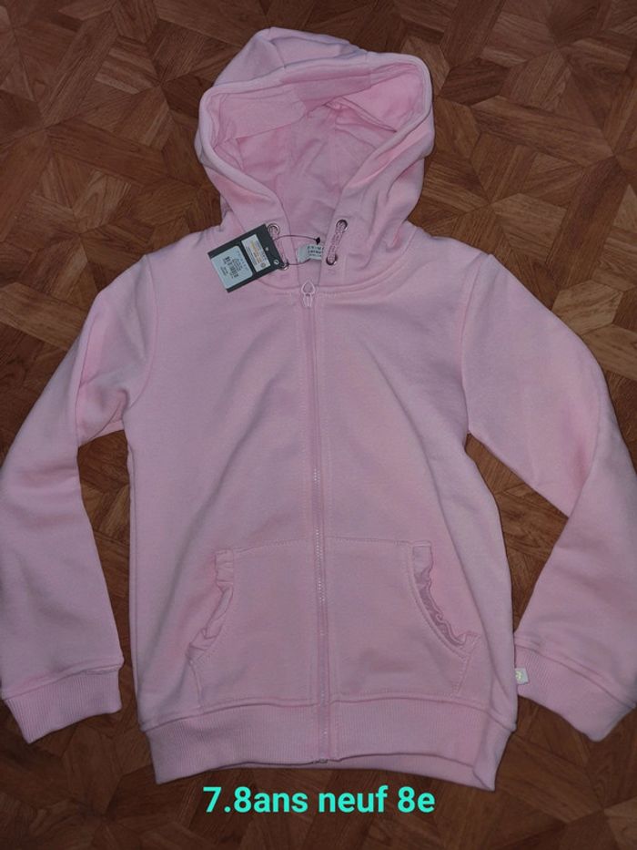 Gilet 8ans neuf