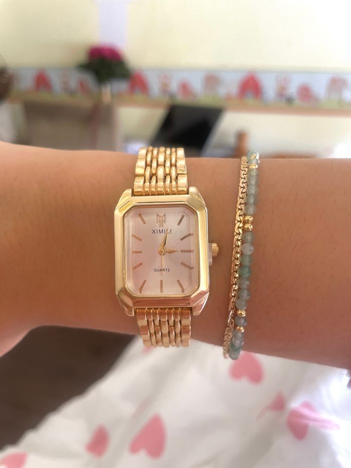 Montre dorée - photo numéro 2