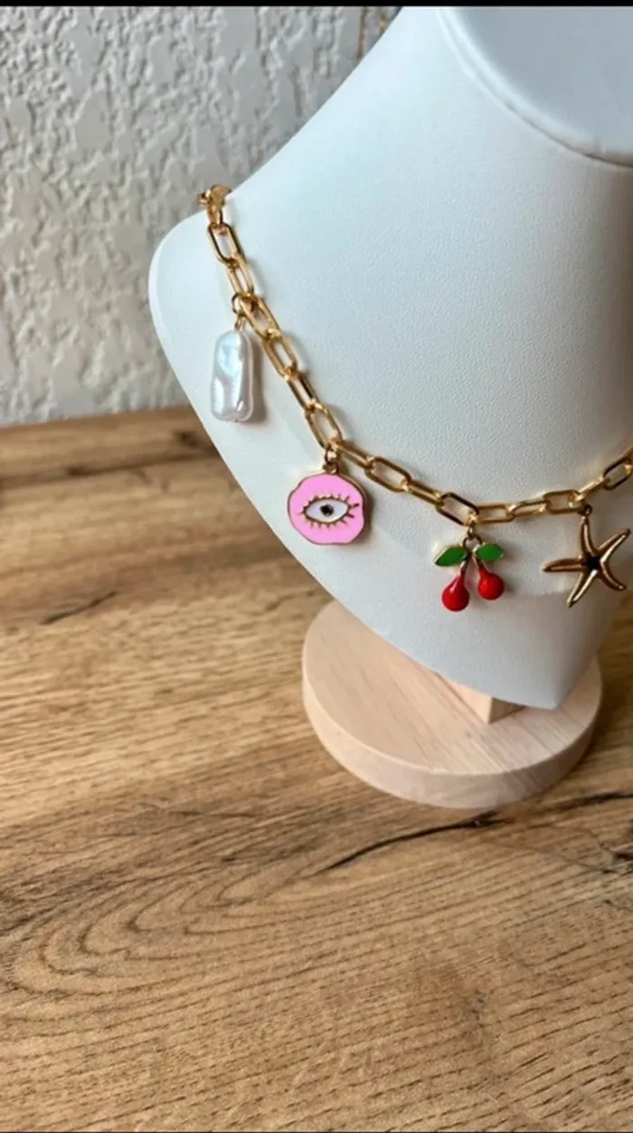 Collier à breloque œil