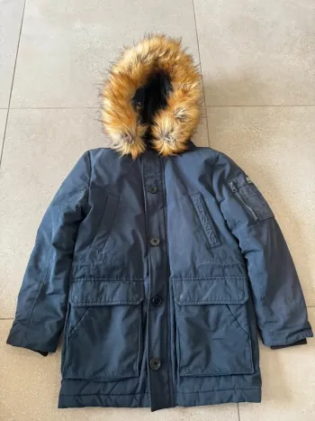 Manteau Redskins 10 ans, bon état,