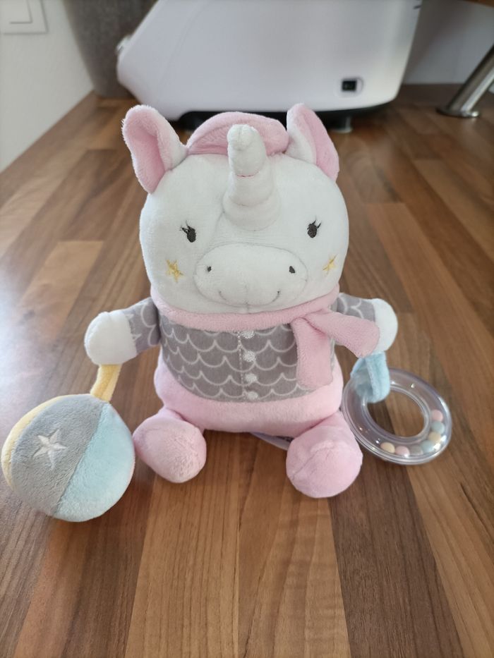 Doudou licorne avec hochets intégrés