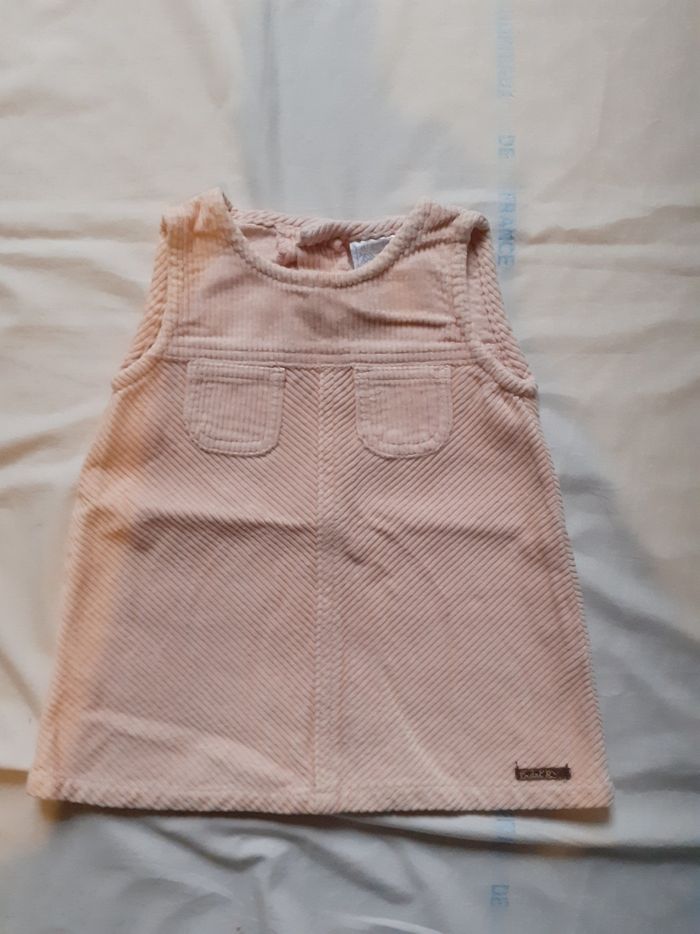 Robe rose clair en velours côtelé avec petites poches