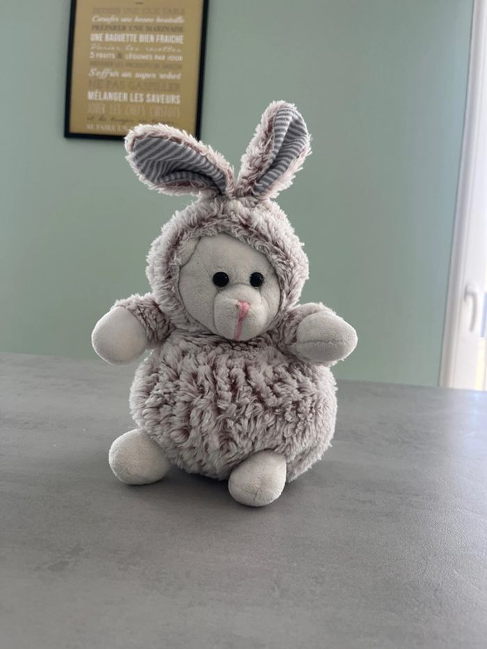 Peluche souris qui se transforme en lapin