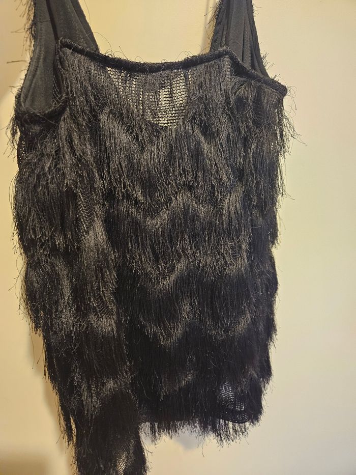 Peti haut a frange noir