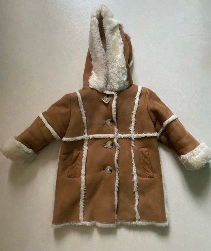 Beau manteau effet peau