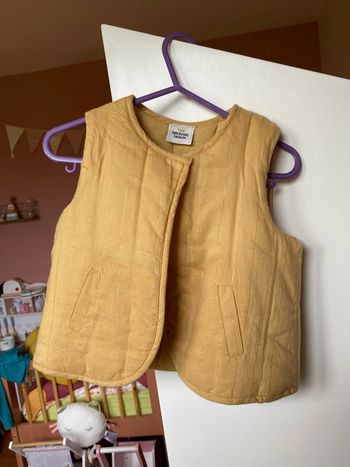 Gilet sans manches tape à l’œil