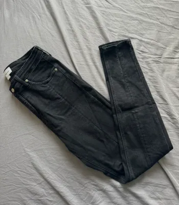 Calvin Klein Jeans Noir High Rise Super Skinny fendu au dessus des chevilles W31 L32