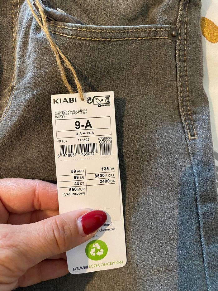 Jeans noir gris à pression kiabi skinny 9 ans NEUF - photo numéro 2