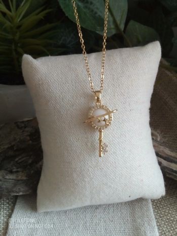 Collier clé des astres avec pierre de jade blanc