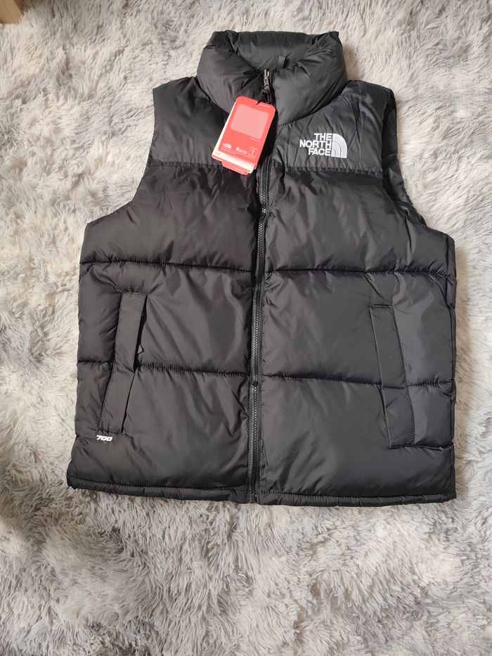 Doudoune sans manche the North face taille M neuf