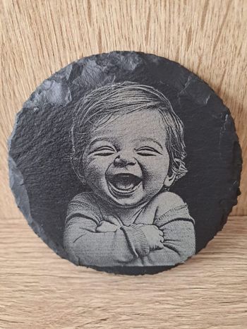 Dessous de verre bébé qui rigole