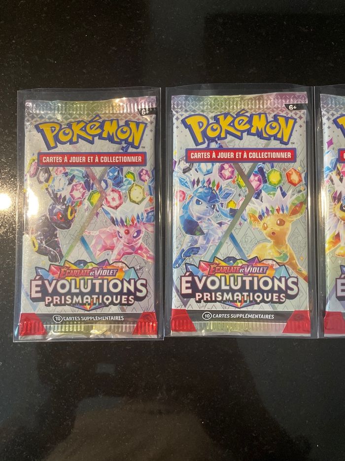 Neuf Artset 4 boosters Pokemon 8.5 évolutions prismatique - photo numéro 2
