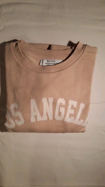 T-shirt Bershka rose clair en XS pour fille.