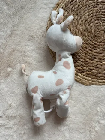 Peluche musicale girafe