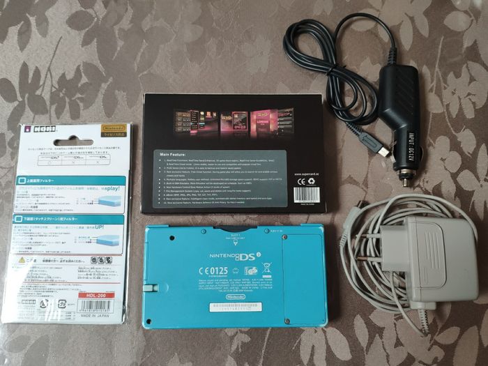 Nintendo DSi bleu avec 10 000 jeux - photo numéro 2