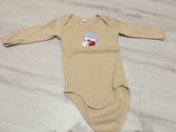 Body 12 mois en tres bon etat