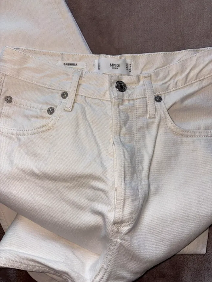 Jean blanc mango à jambes larges taille 34 femme en très bon état - photo numéro 3