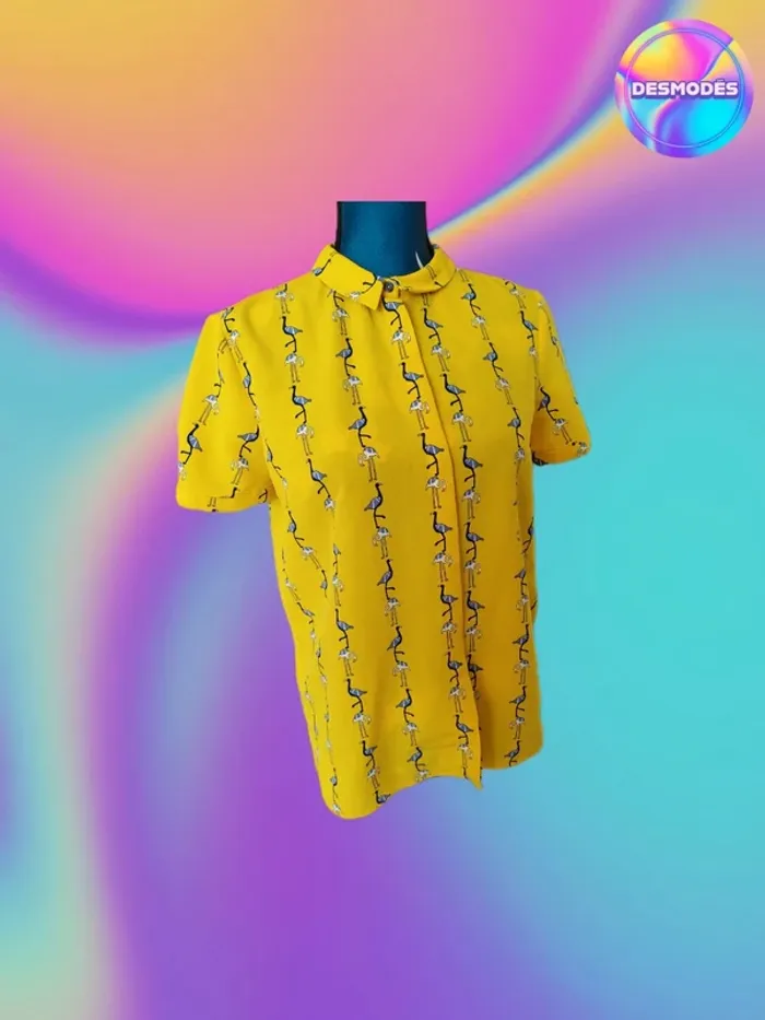 Très jolie blouse jaune flamand avec col chemise et noeud