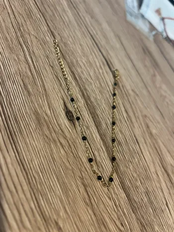 Bracelet doré et noir