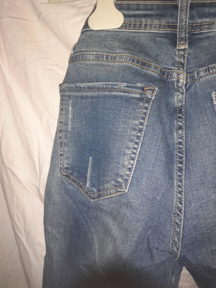 Jeans style usé bleu - photo numéro 7