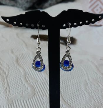 Lot bague et boucle d'oreille toute neuve