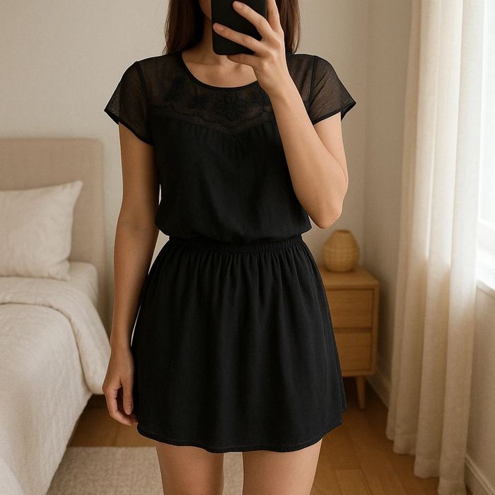 Robe noire chic taille L Beckaro - comme neuve
Très jolie robe noire