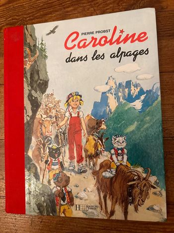 Livre bd album rouge Caroline dans les Alpages édition limitée