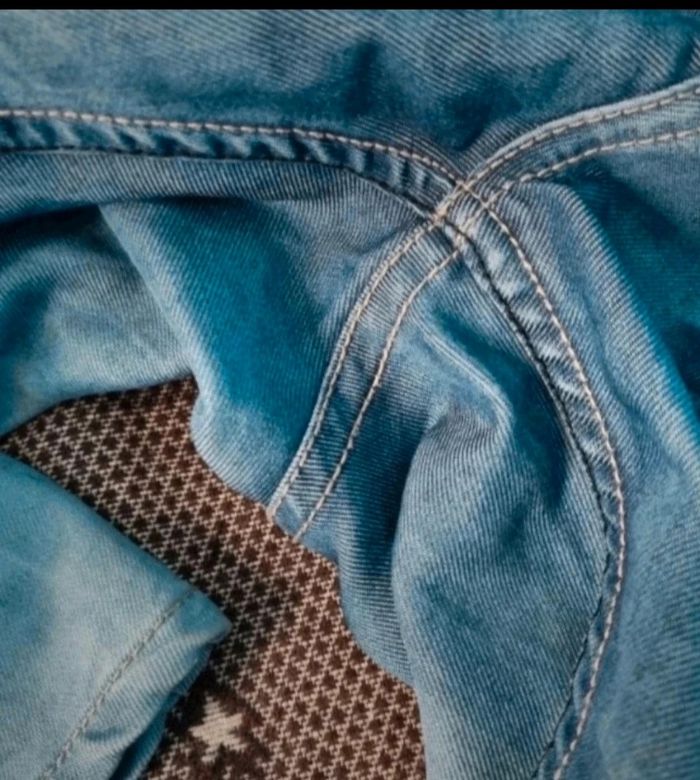 Jeans effet délavé - photo numéro 8