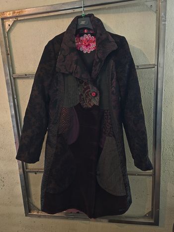 A vendre manteau desigual