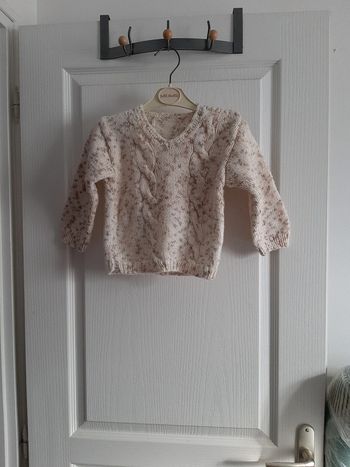 Pull en laine (boutonnière sur côté)