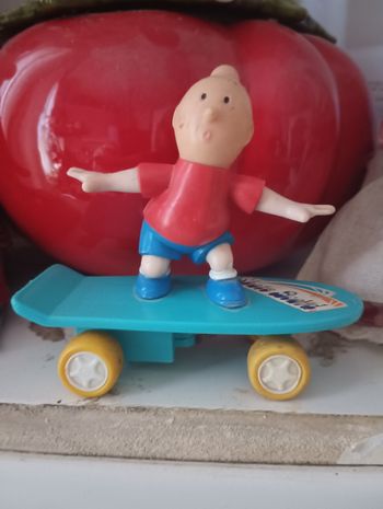 Tintin sur planche a roulettes a friction.. vintage.collector