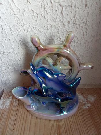 Porte style dauphins brillants