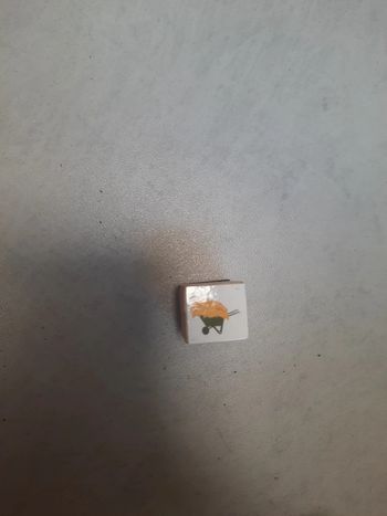 Un mini tampon brouette foin