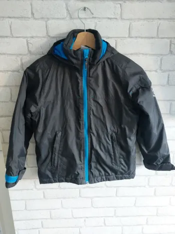 Imperméable avec capuche Oxylane taille 6
ans