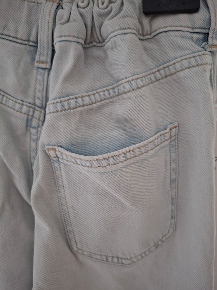 Jeans bleu clair cargo large réglable 12 ans H&M 
Très bon état - photo numéro 6