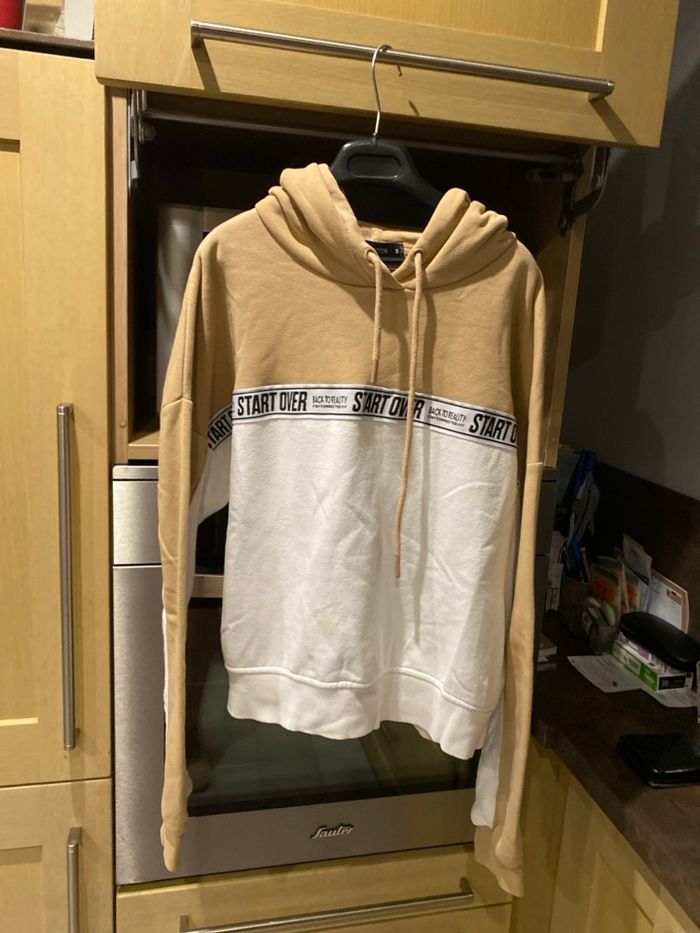 Suite à capuche femme