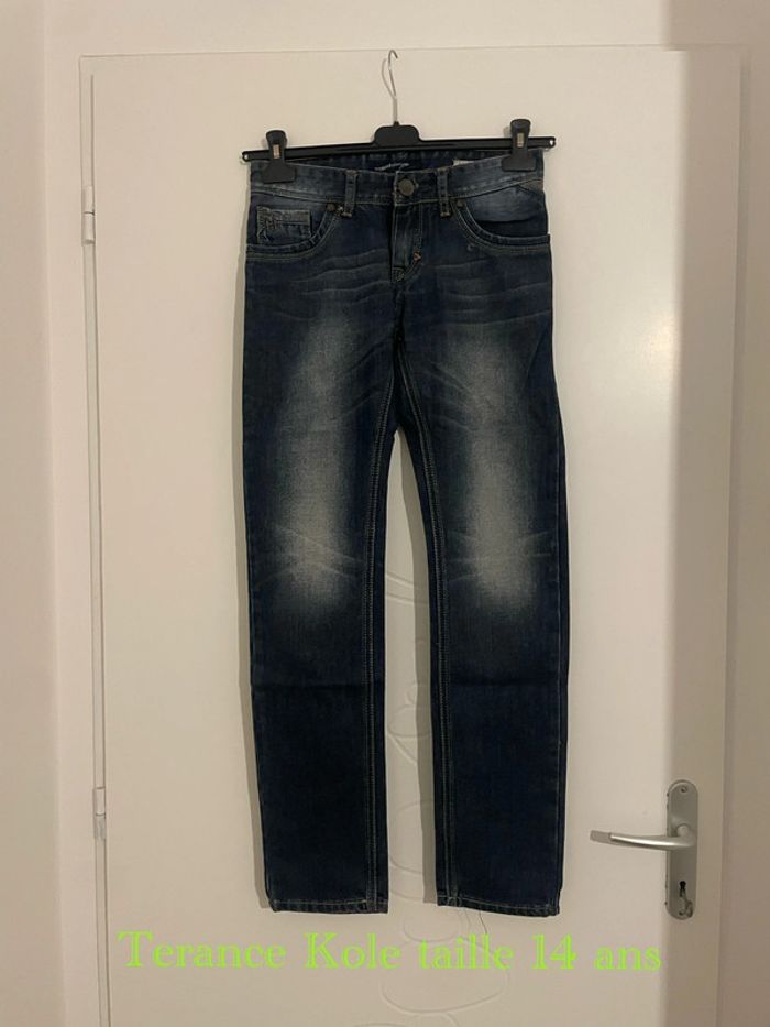 Jean taille haute coupe slim bleu foncé effet délavé Terance Kole taille 14 ans