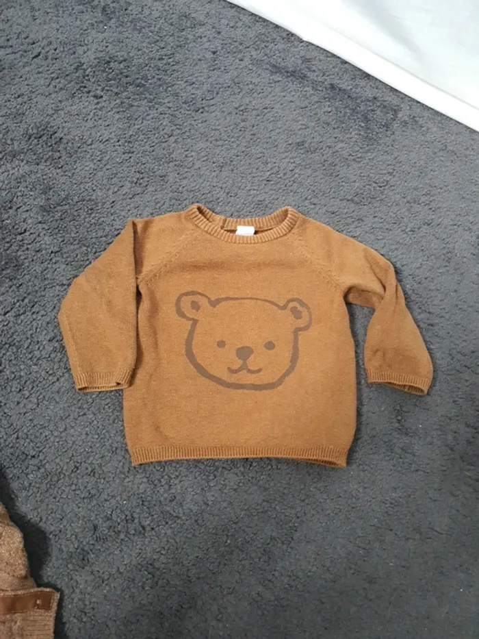 Pull marron tête d'ours