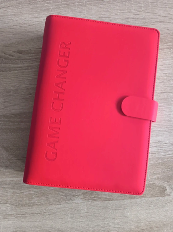 Un agenda business coach en cuir rouge