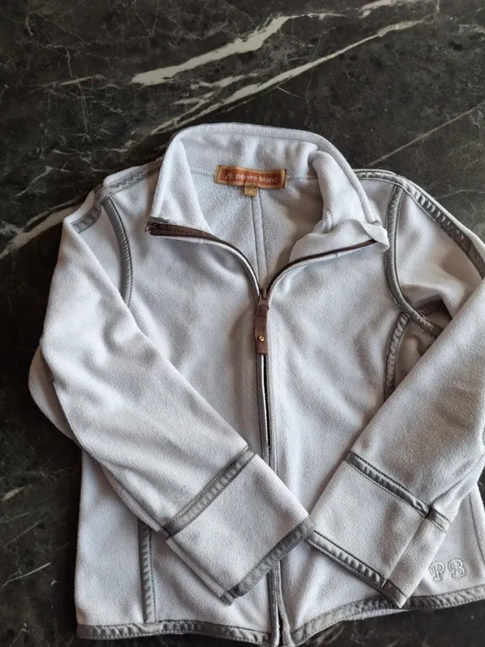 Gilet poivre blanc taille 6 ans en parfait état