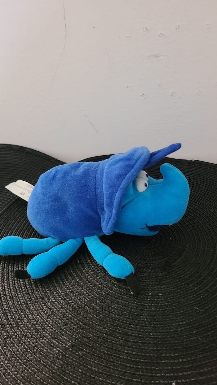 Peluche Cake DISNEY Pixar Les 1001 Pattes bleu 20 cm - photo numéro 6