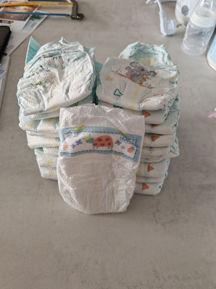 21 Couches pampers taille 1 - photo numéro 3