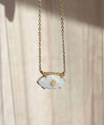 Collier grigri œil Pierre de Lune